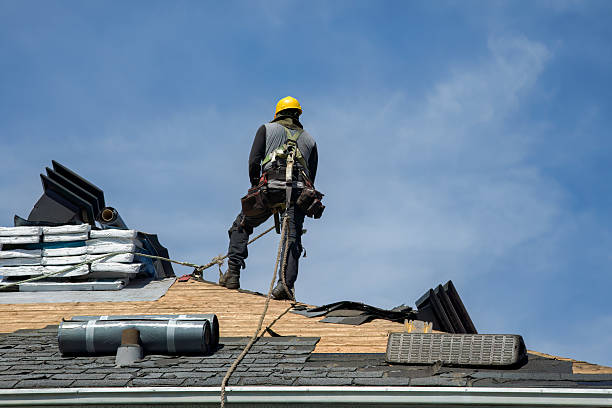 Professional Roof Replacement technician working in Bayside, NY